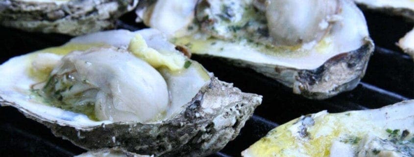 Grilled Oysters with Roasted Garlic