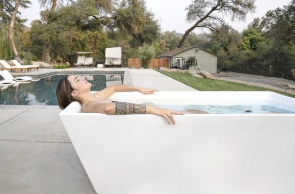 Plunge woman by pool